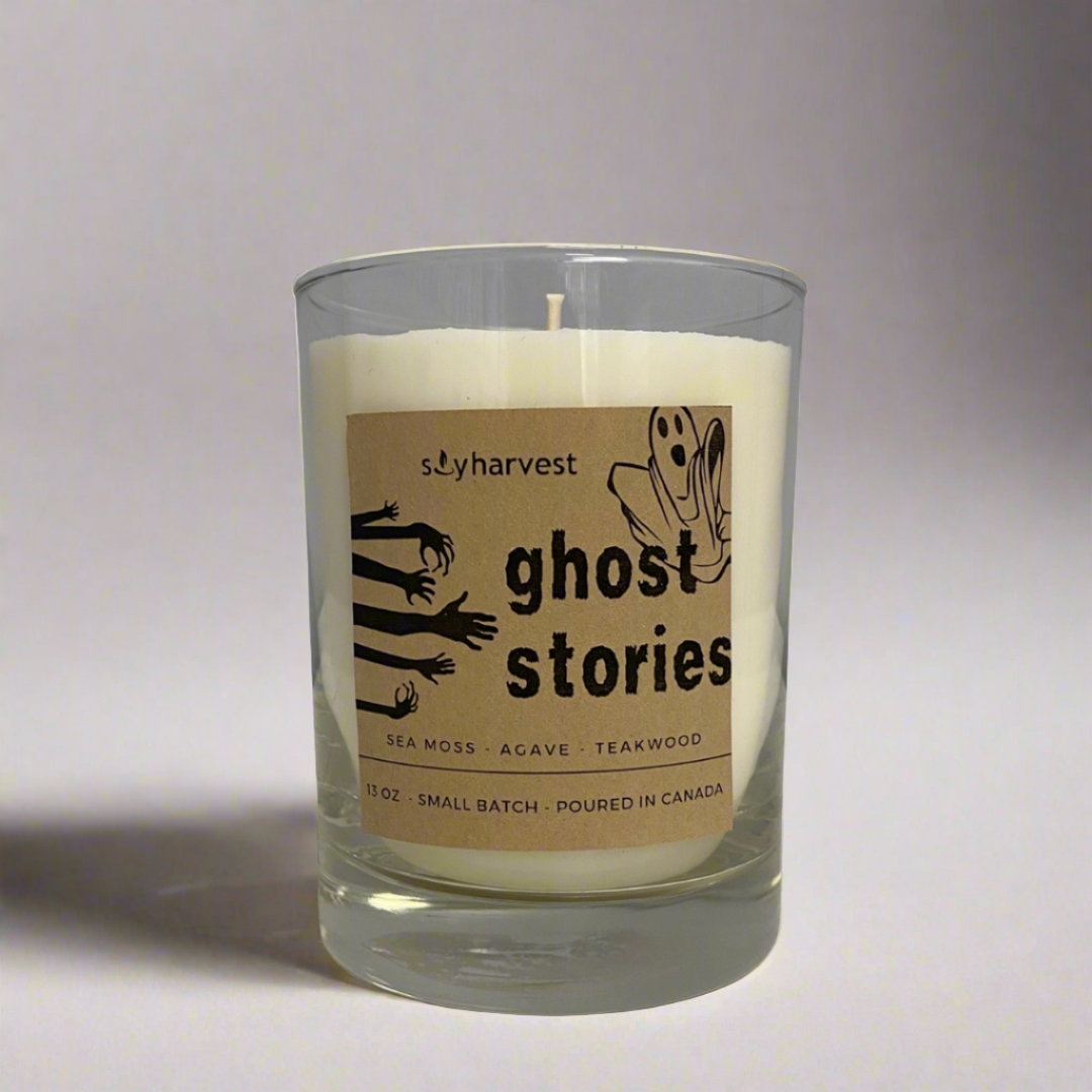 white candle with cotton wick ghosts on label