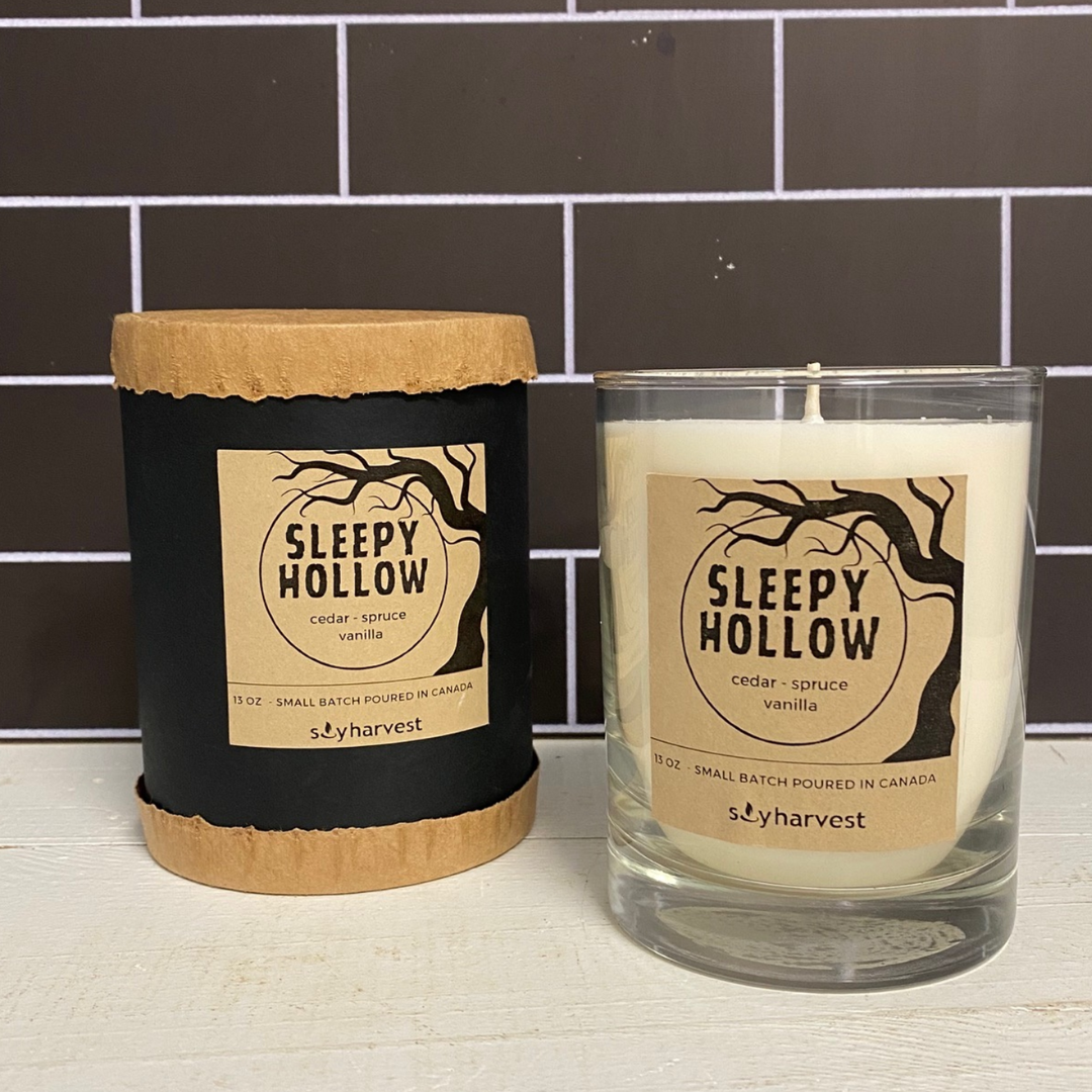 white candle. sleepy hollow brand